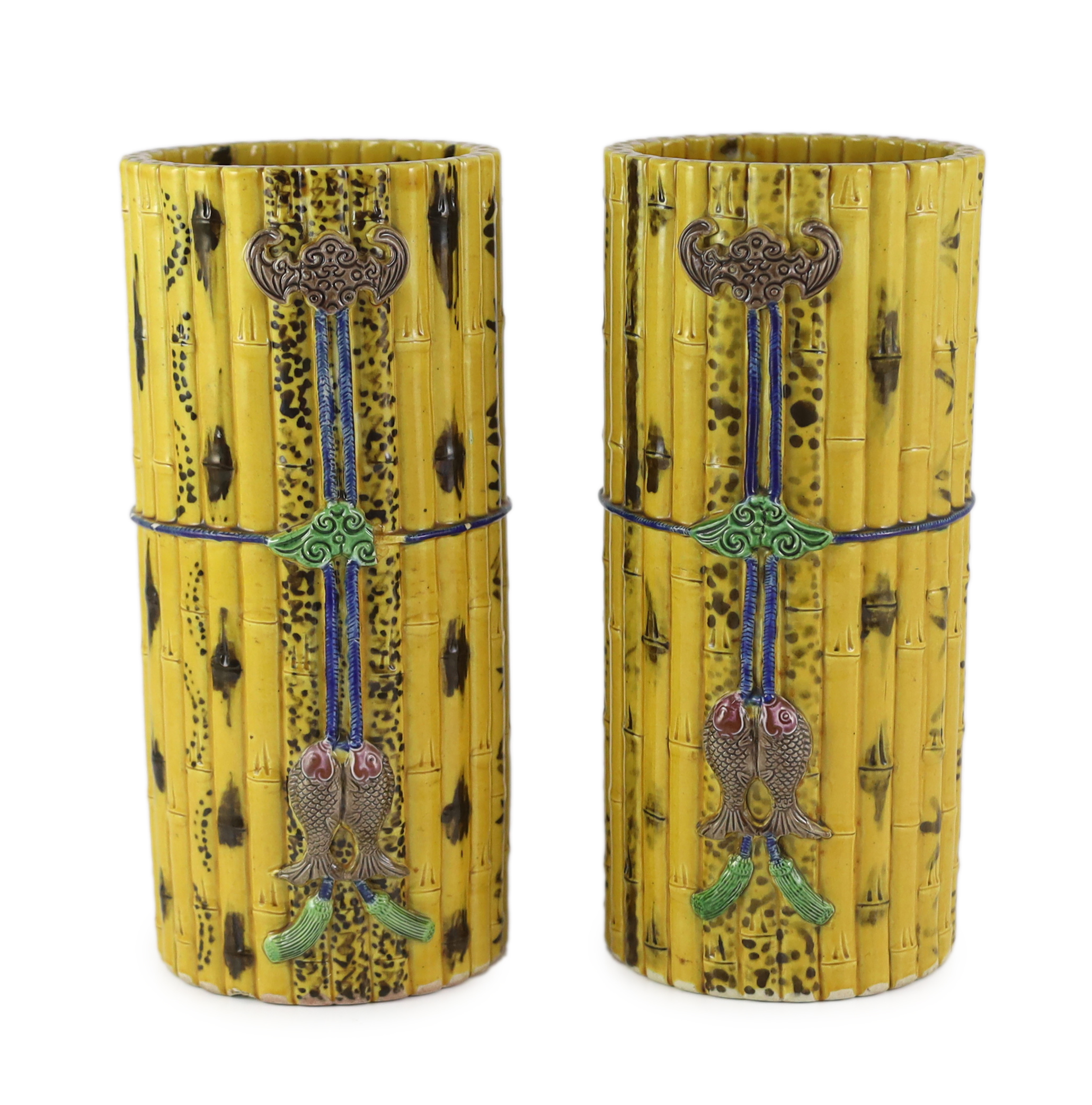 A pair of Chinese faux bamboo porcelain hat stands, late 19th century